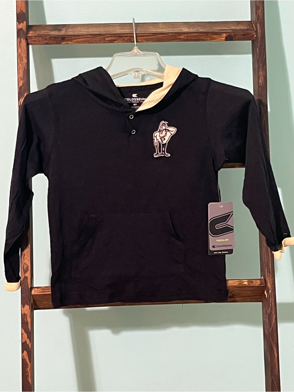 Colosseum Black Hoodie with Cream Trim and Chest Patch